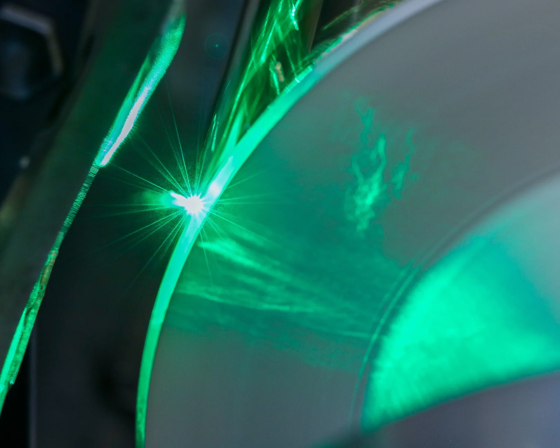 Precision laser engraving detail showing micron-level accuracy on cylinder surface